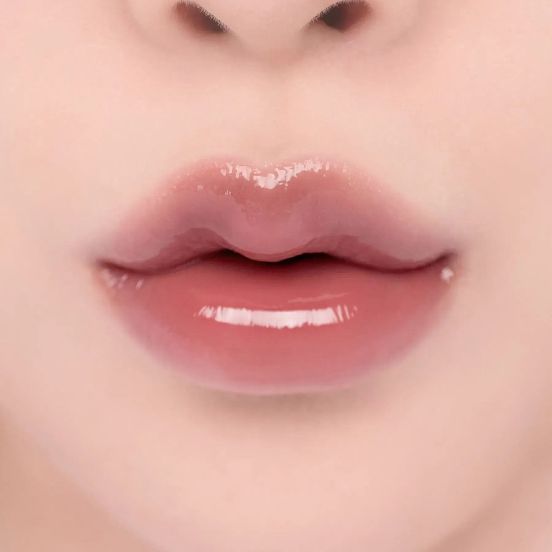 blysk-dlia-hub-u-vidtinku-troiandy-romnd-glasting-color-gloss-03-rose-finch-67286622868061